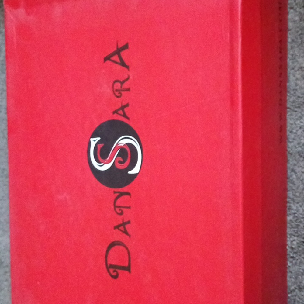 Never worn Dan Sara Heels